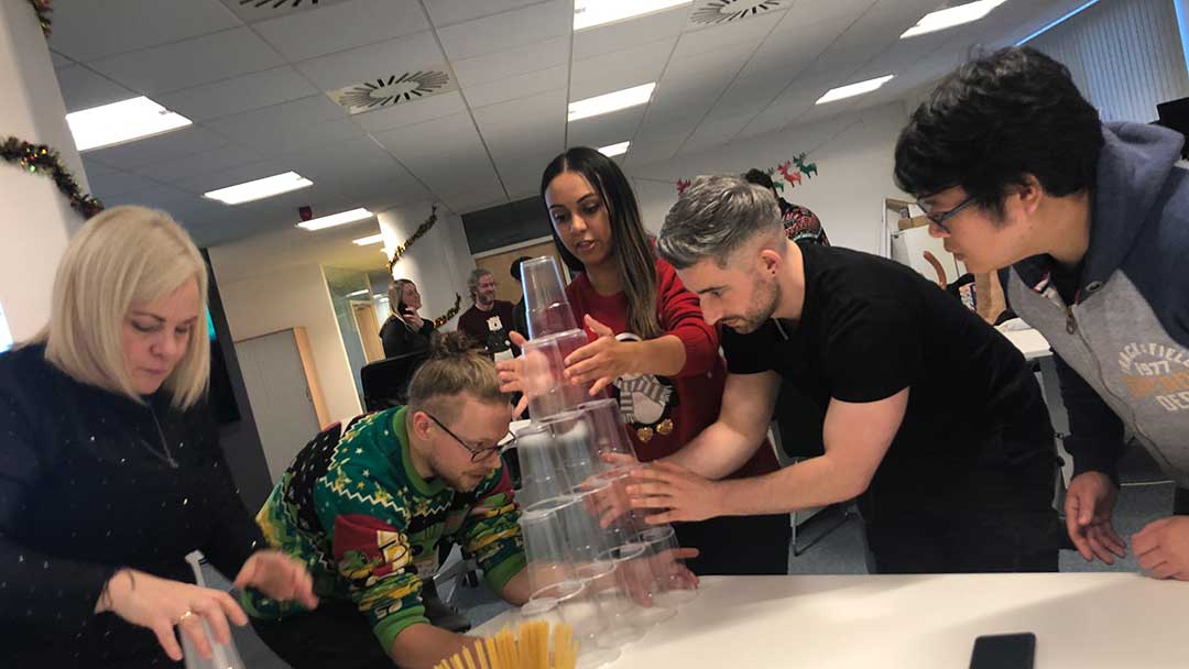 Team doing team building challenge